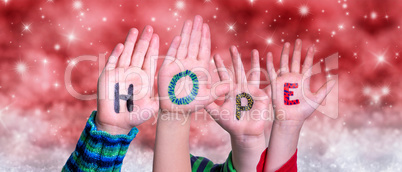 Children Hands Building Word Hope, Red Christmas Background