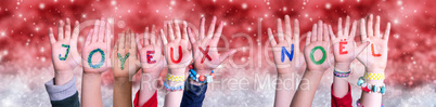 Children Hands Joyeux Noel Means Merry Christmas, Red Christmas Background