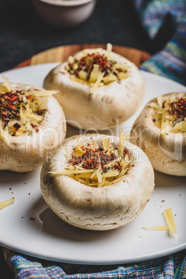 Button mushrooms stuffed with cheese and spices