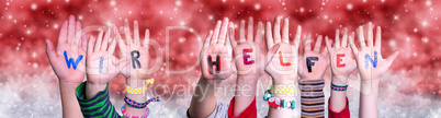 Children Hands Wir Helfen Means We Help, Red Christmas Background