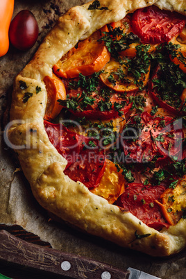 Baked tomato galette on baking paper