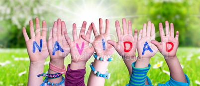 Children Hands Building Word Navidad Means Christmas, Grass Meadow