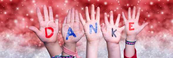 Children Hands Danke Means Thank You, Red Christmas Background