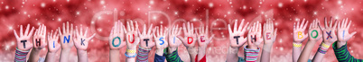 Children Hands Building Word Think Outside The Box, Red Christmas Background