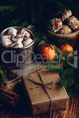 Gift box and hot chocolate with marshmallows
