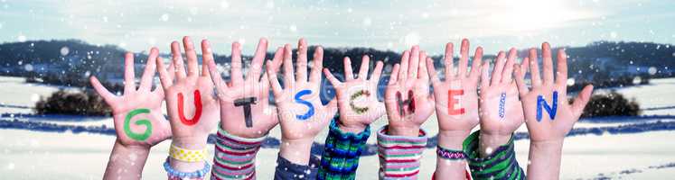 Children Hands Building Word Gutschein Means Voucher, Snowy Winter Background