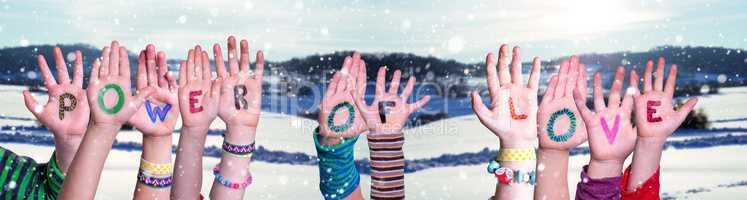 Children Hands Building Word Power Of Love, Snowy Winter Background