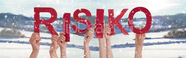 People Hands Holding Word Risiko Means Risk, Snowy Winter Background