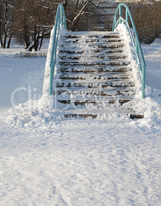 bridge over pond at winter