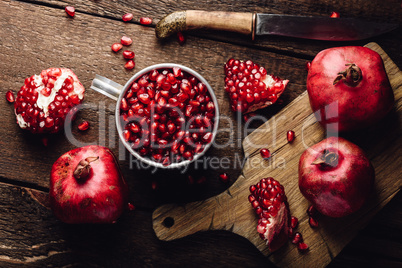 Mug full of pomegranate seeds