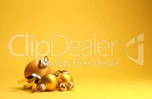 Three golden vintage Christmas baubles on a yellow background