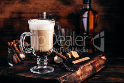 Irish coffee in drinking glass