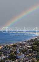 Rainbow over the aerial view of the beach of Provincetown coast