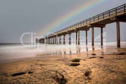 Rainbow over Scripps pier Beach in La Jolla