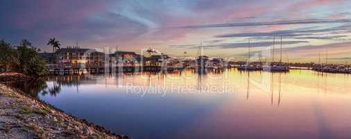 Sunrise over Naples City Dock in Naples, Florida.