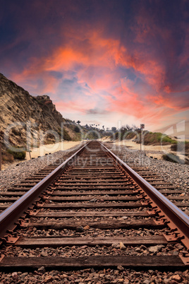Sunset over Train tracks run through San Clemente State Beach