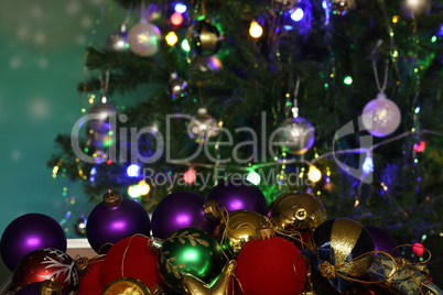 Christmas composition of bright multi-colored Christmas tree decorations