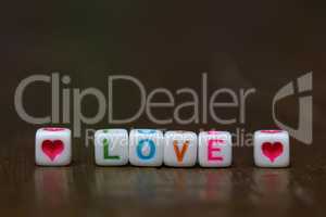 Small plastic cubes with the word - LOVE