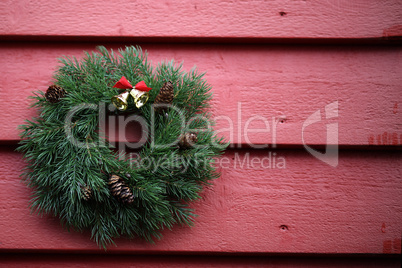 Christmas wreath of fir branches at the front door