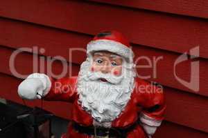 Ceramic Santa Claus at the entrance to the House