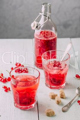 Infused water with red currant and sugar