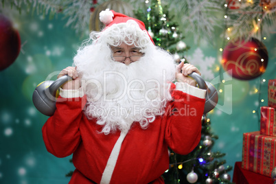 Santa Claus at the festive New Year tree