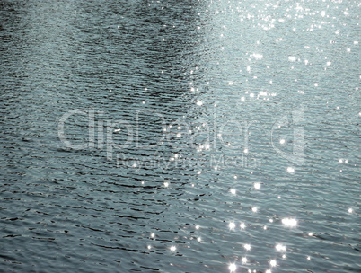 glare on water in city park pond