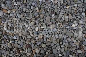 Pile sea gray stones. Background from sea gray stones