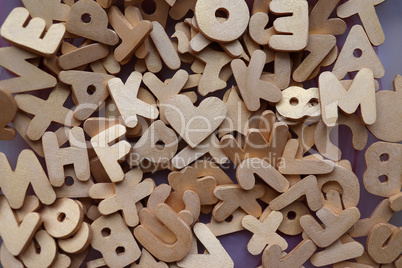 Letters, numbers and other figures sawn out of plywood