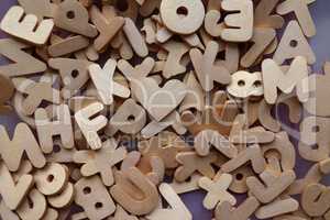 Letters, numbers and other figures sawn out of plywood