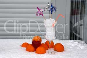 Winter still life with oranges in the snow