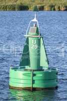 Shipping buoy on the IJ in Amsterdam in the Netherlands.
