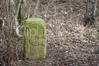 Old border marker on the border of the Netherlands and Germany.
