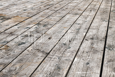 Background photo of weathered gray wooden planks.