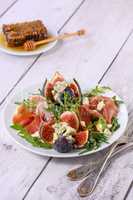 Prosciutto with figs and blue cheese