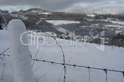 Fence with the background of the german area called Rothaargebirge