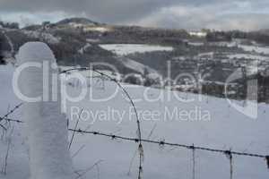 Fence with the background of the german area called Rothaargebirge