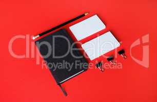Notebook, business cards, pencil