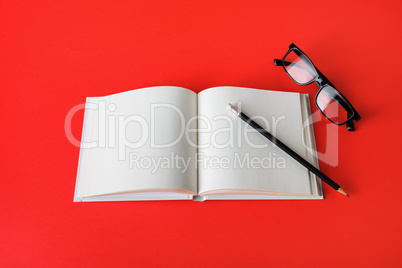 Book, pencil, glasses