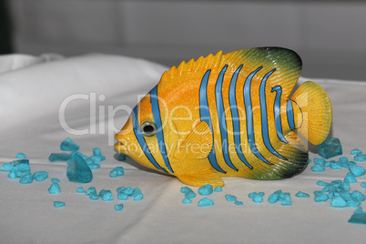 A beautiful decorative fish serves as a table decoration