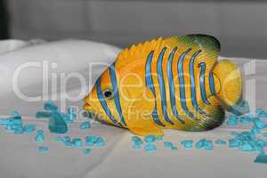 A beautiful decorative fish serves as a table decoration