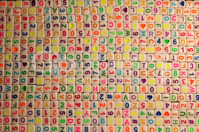 Background from cubes with letters and numbers