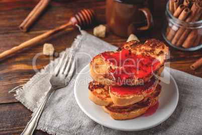 Stack of french toasts with berry marmalade