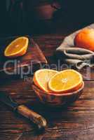 Slices of orange in a rustic bowl