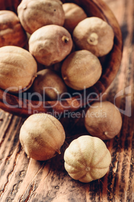 Dried limes on wooden table