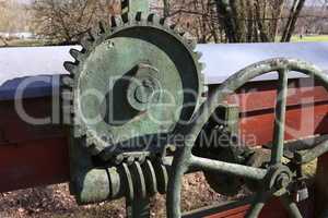 Old mechanism with a cogwheel and a worm gear