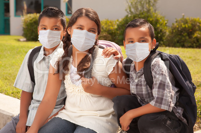 Young Hispanic Students on School Campus Wearing Medical Face Ma