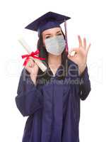 Graduating Female Wearing Medical Face Mask and Cap and Gown  Is