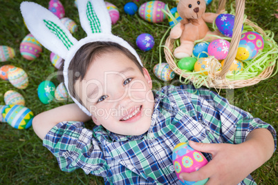 Mixed Race Chinese and Caucasian Boy Outside Wearing Rabbit Ears