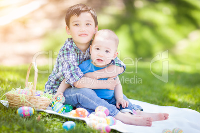 Mixed Race Chinese and Caucasian Boys Outside in Park Playing wi